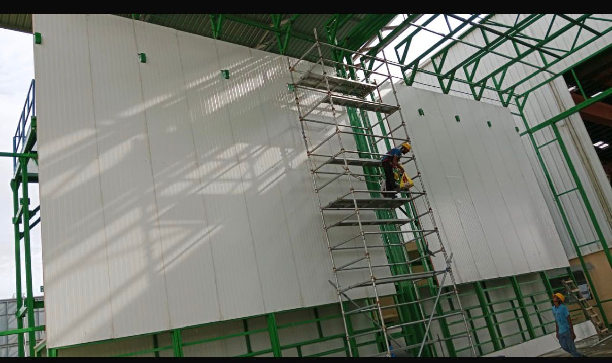 PUF panel installation on prefabricated structure