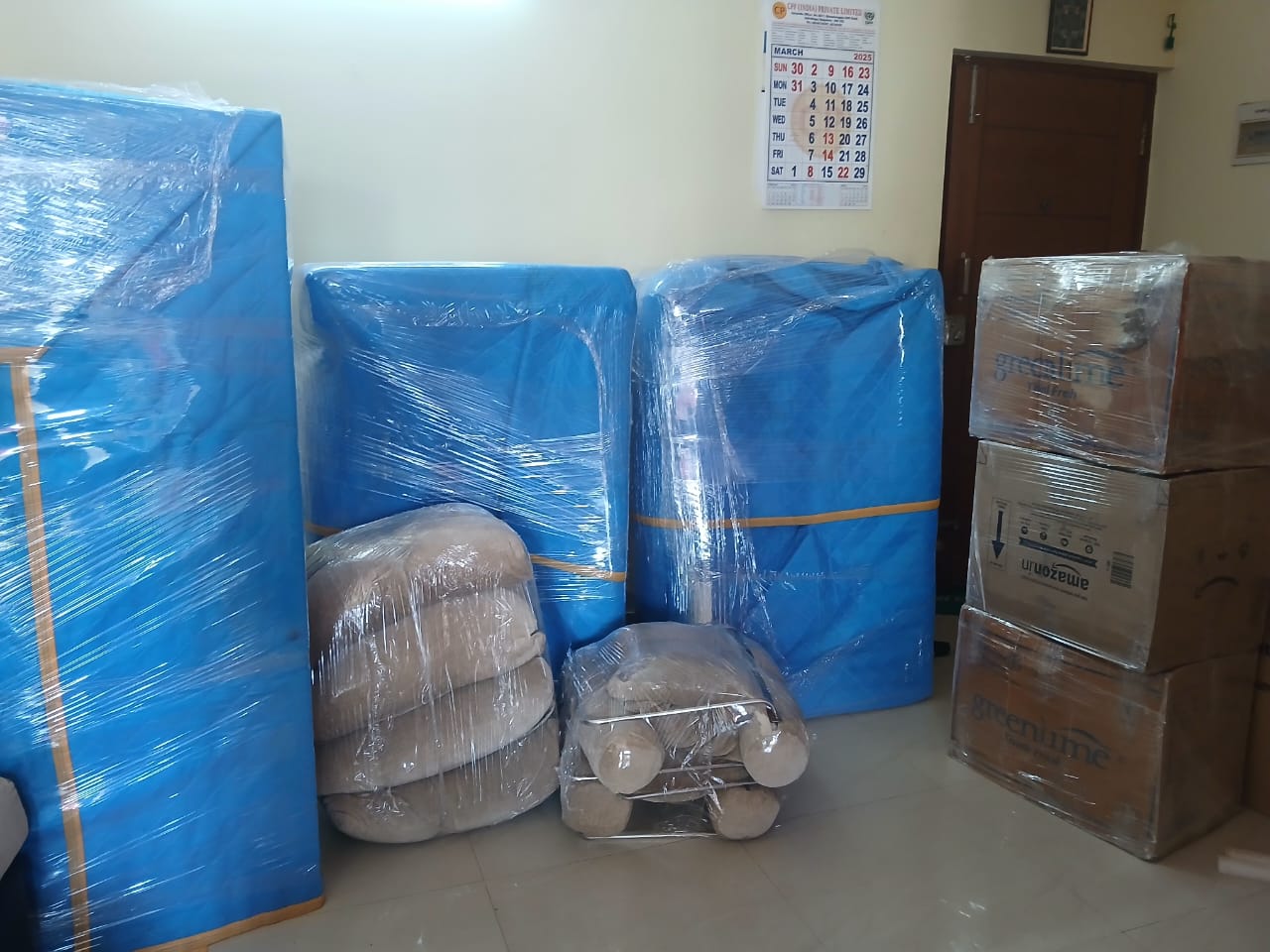 City house shifting packed boxes and sofa