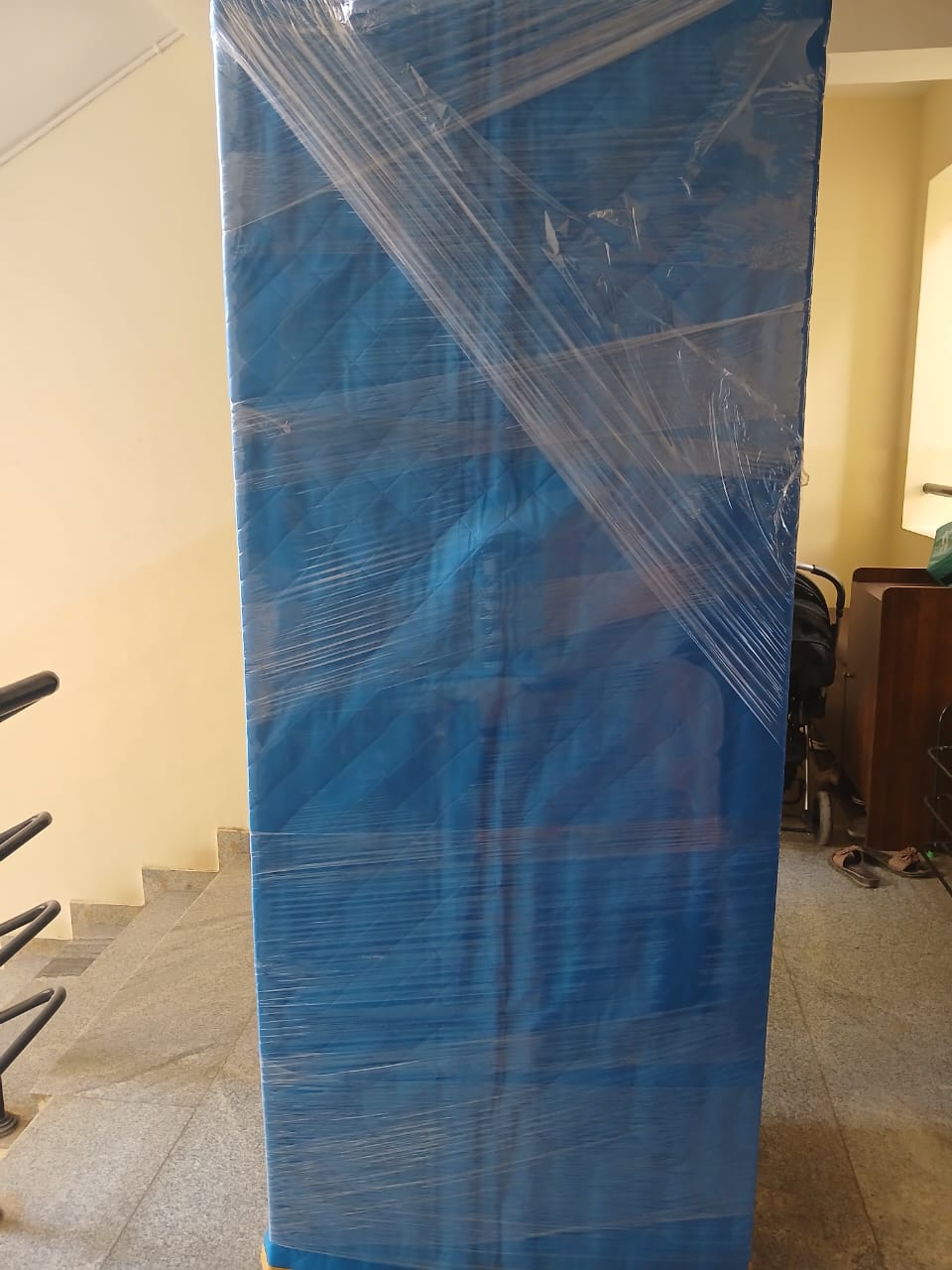 City house shifting tall wrapped item