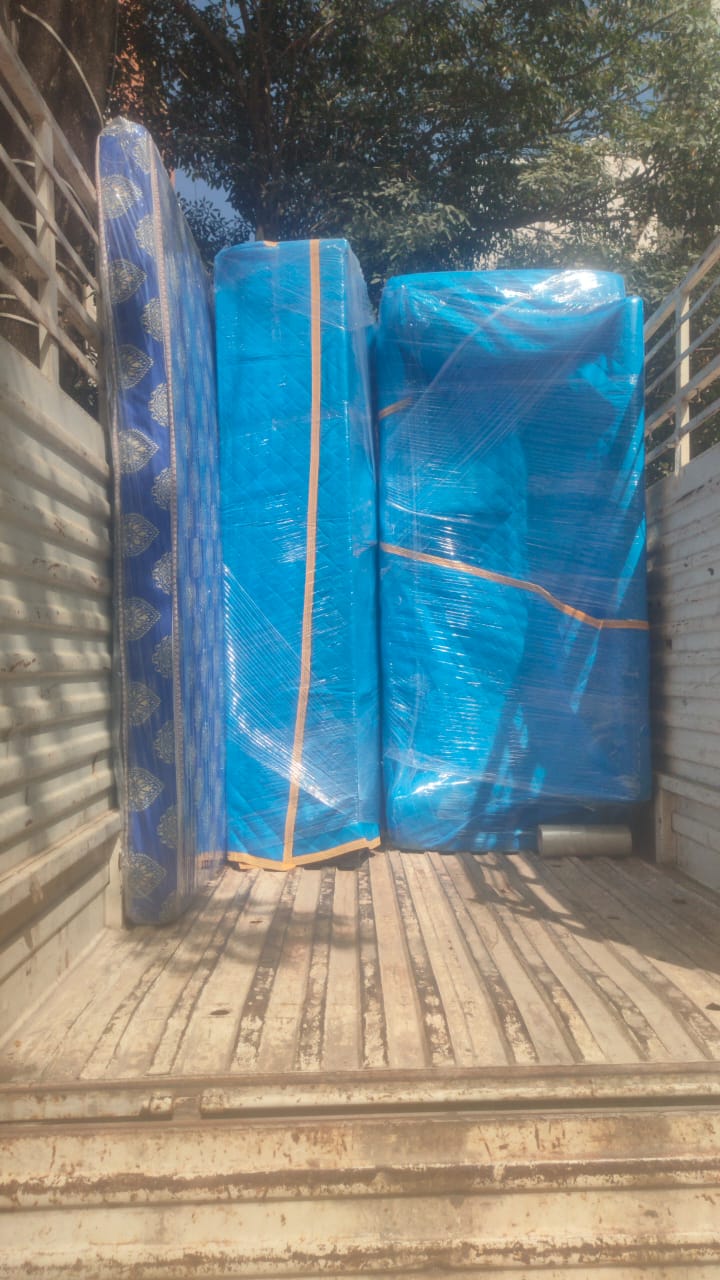 City house shifting loaded blue packed furniture