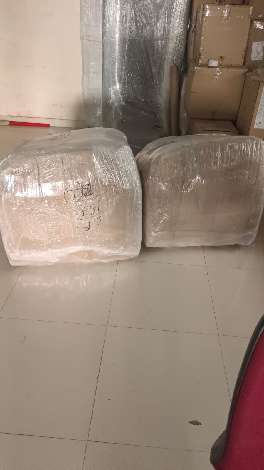 Wrapped home furniture ready for shifting